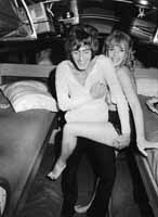 Roger Daltrey and groupie aboard Who bus